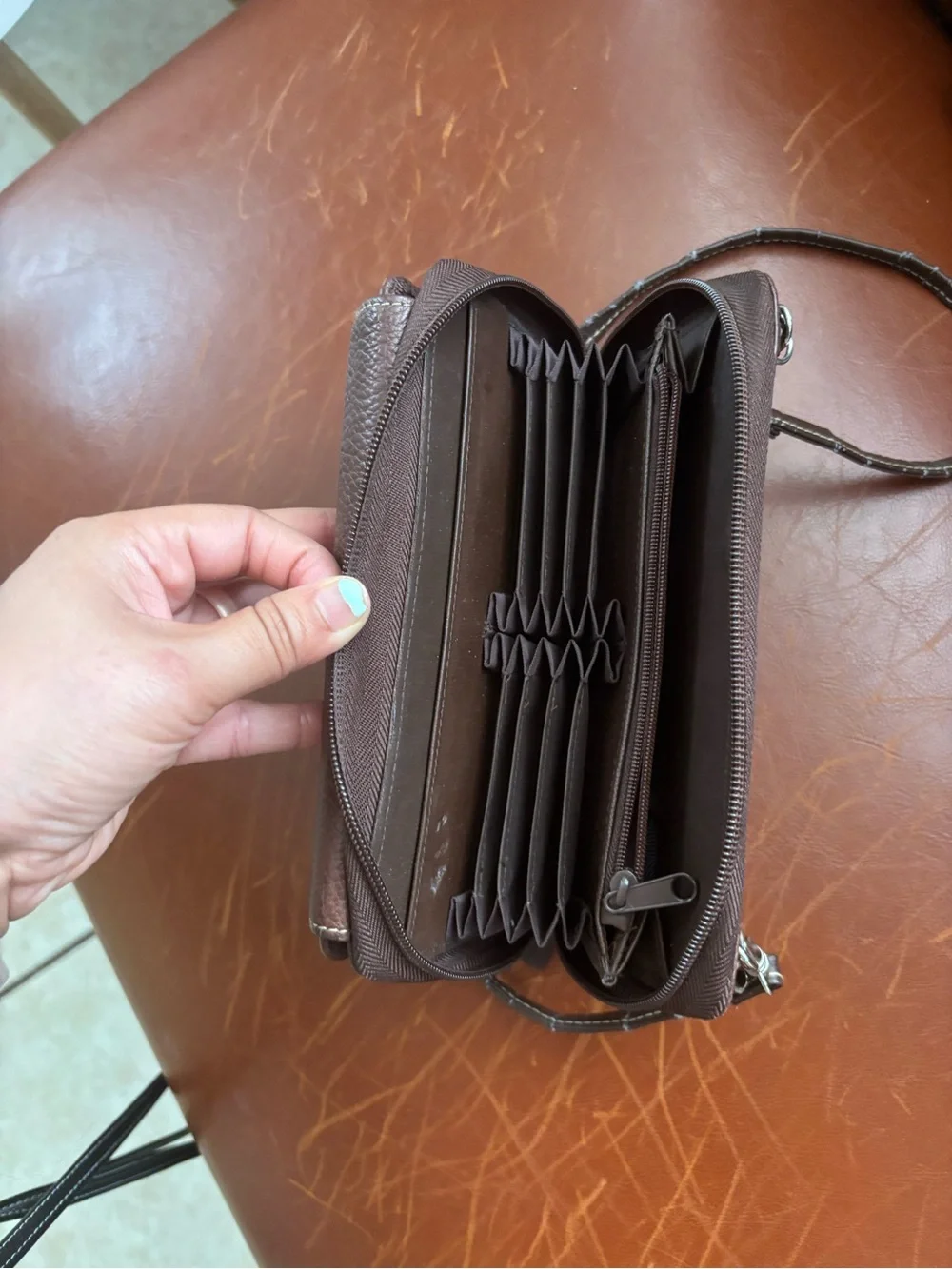 Genuine Buxton leather crossbody brown
